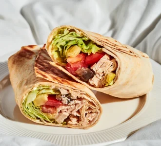 shawarma-with-chicken-and-vegetables-in-a-plate-on-2024-12-06-04-16-49-utc.webp